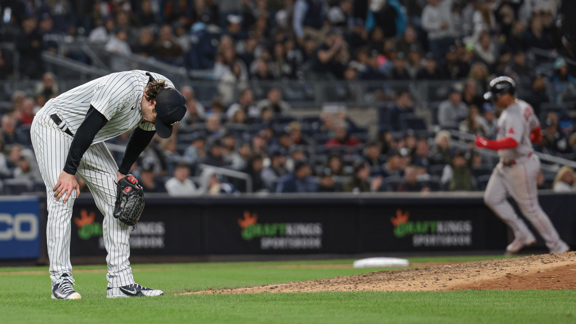New York Yankees pitcher Gerrit Cole and Boston Red Sox third baseman Rafael Devers