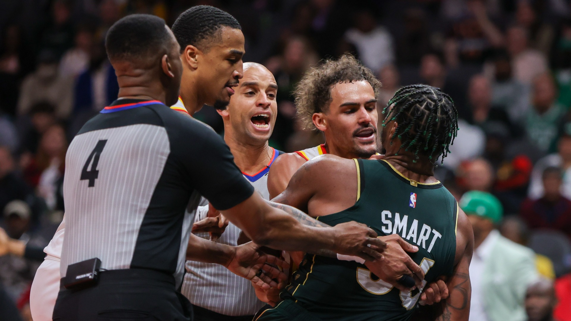 Atlanta Hawks guard Trae Young and Boston Celtics guard Marcus Smart