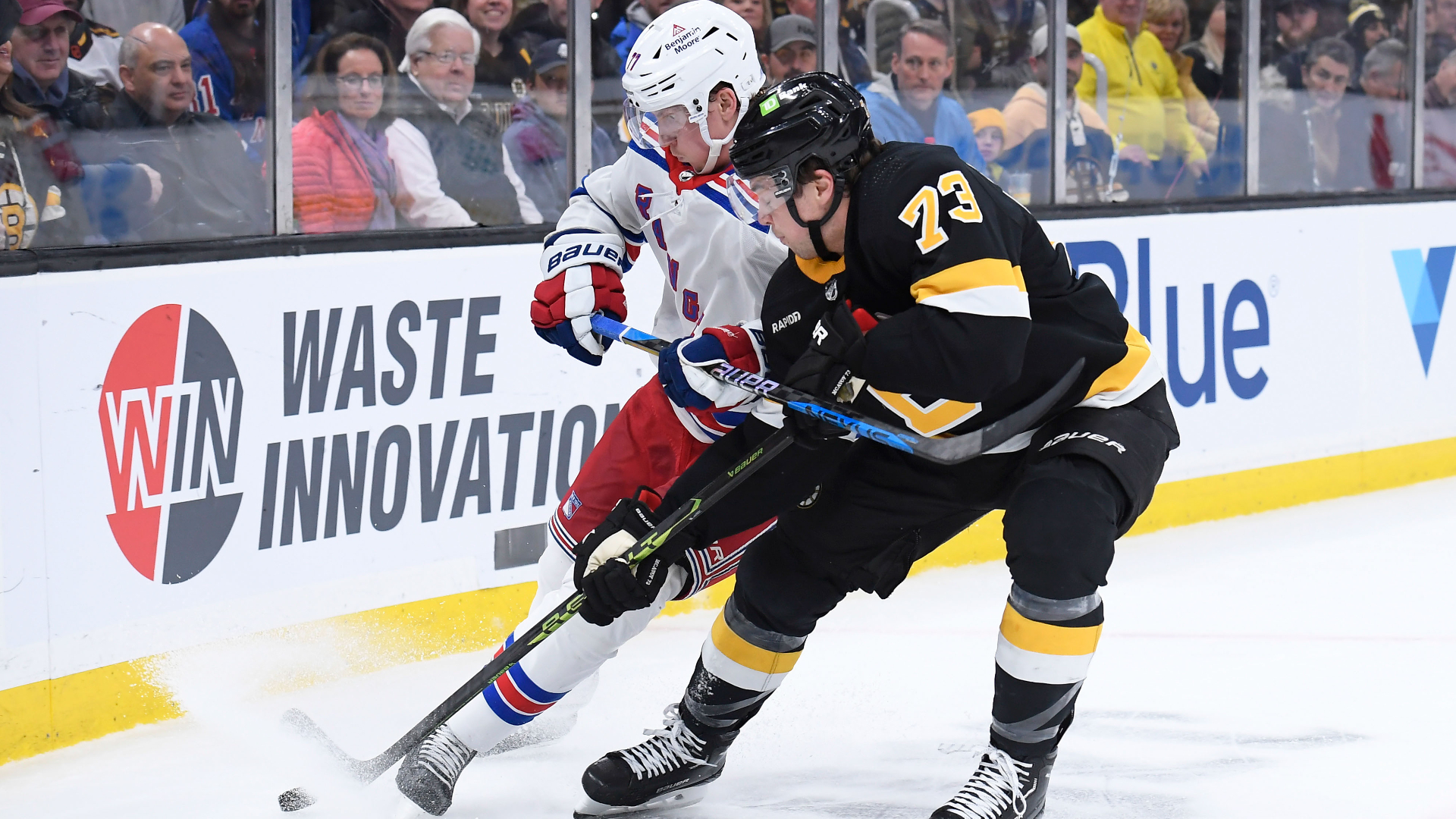 Boston Bruins defenseman Charlie McAvoy, New York Rangers defenseman Niko Mikkola
