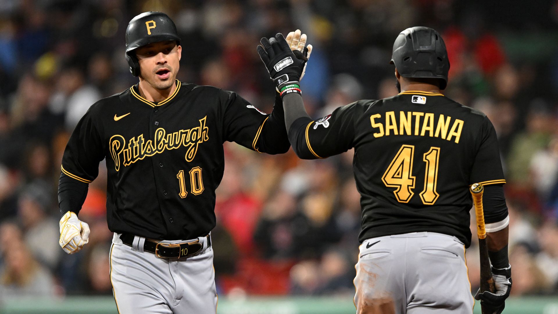 Pittsburgh Pirates teammates Bryan Reynolds, Carlos Santana