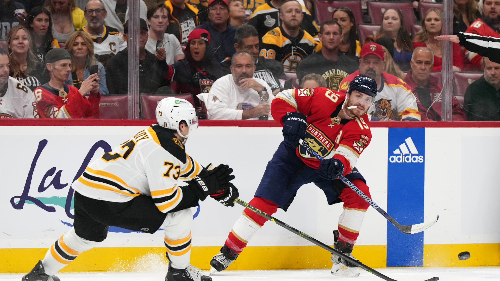 Boston Bruins defenseman Charlie McAvoy and Florida Panthers left wing Matthew Tkachuk