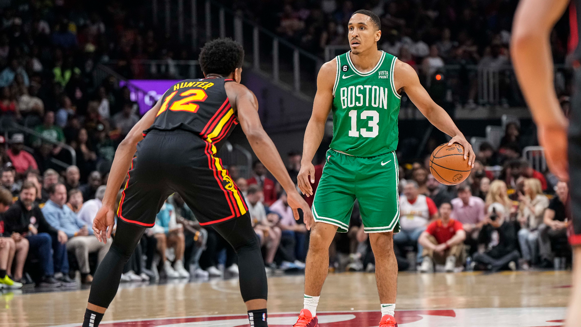 Atlanta Hawks forward De'Andre Hunter and Boston Celtics guard Malcolm Brogdon