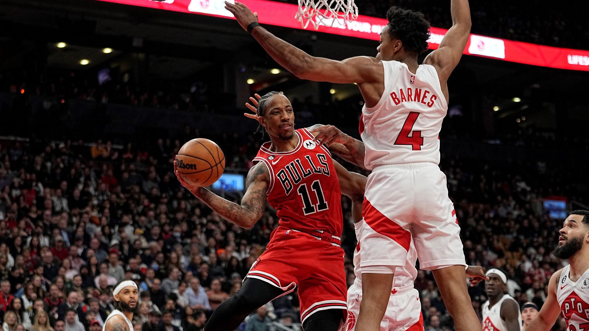 Chicago Bulls forward DeMar DeRozan and Toronto Raptors forward Scottie Barnes