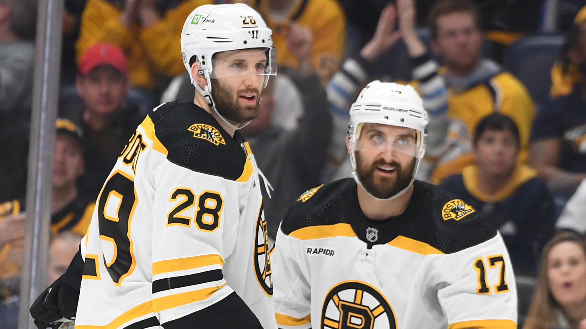 Boston Bruins defenseman Derek Forbort and left wing Nick Foligno