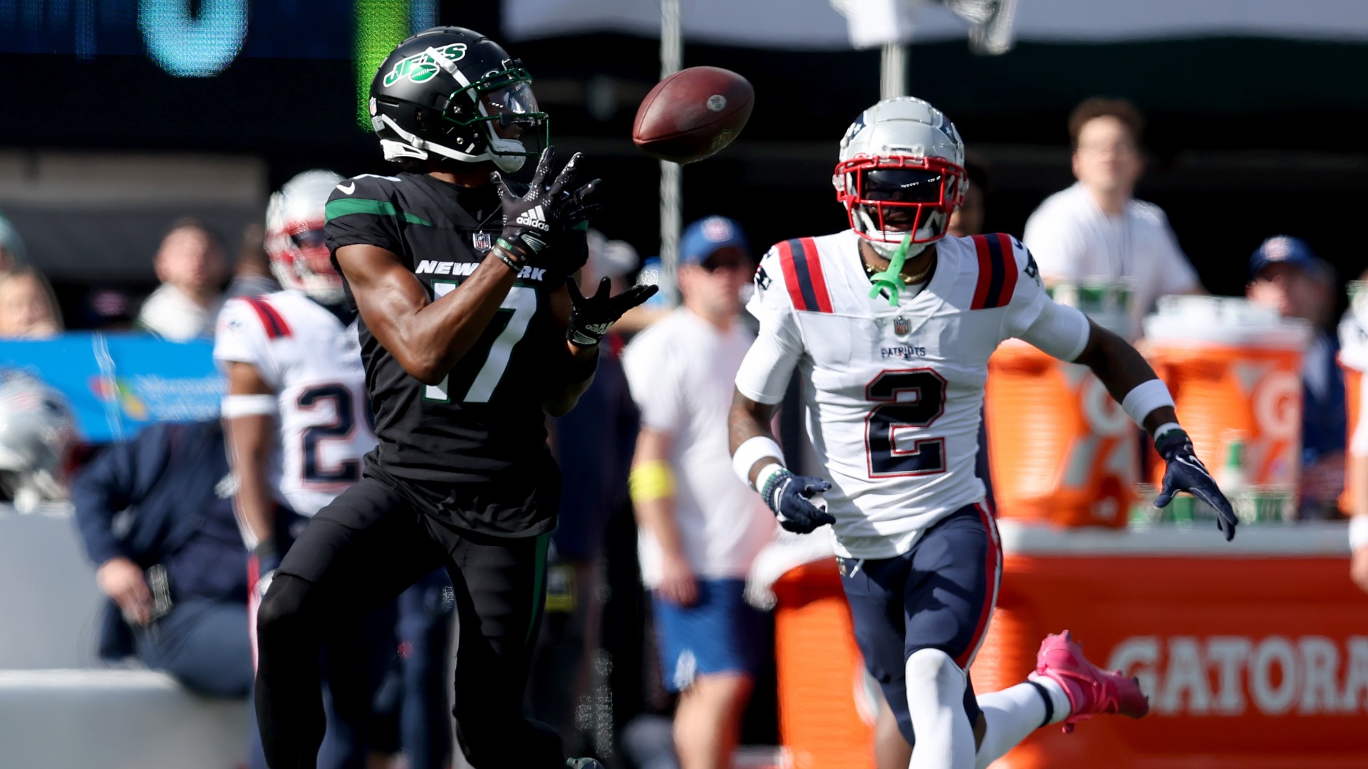 New York Jets wide receiver Garrett Wilson, New England Patriots cornerback Jalen Mills