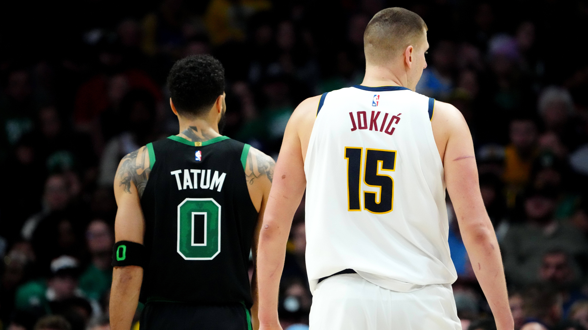 Boston Celtics forward Jayson Tatum and Denver Nuggets center Nikola Jokic