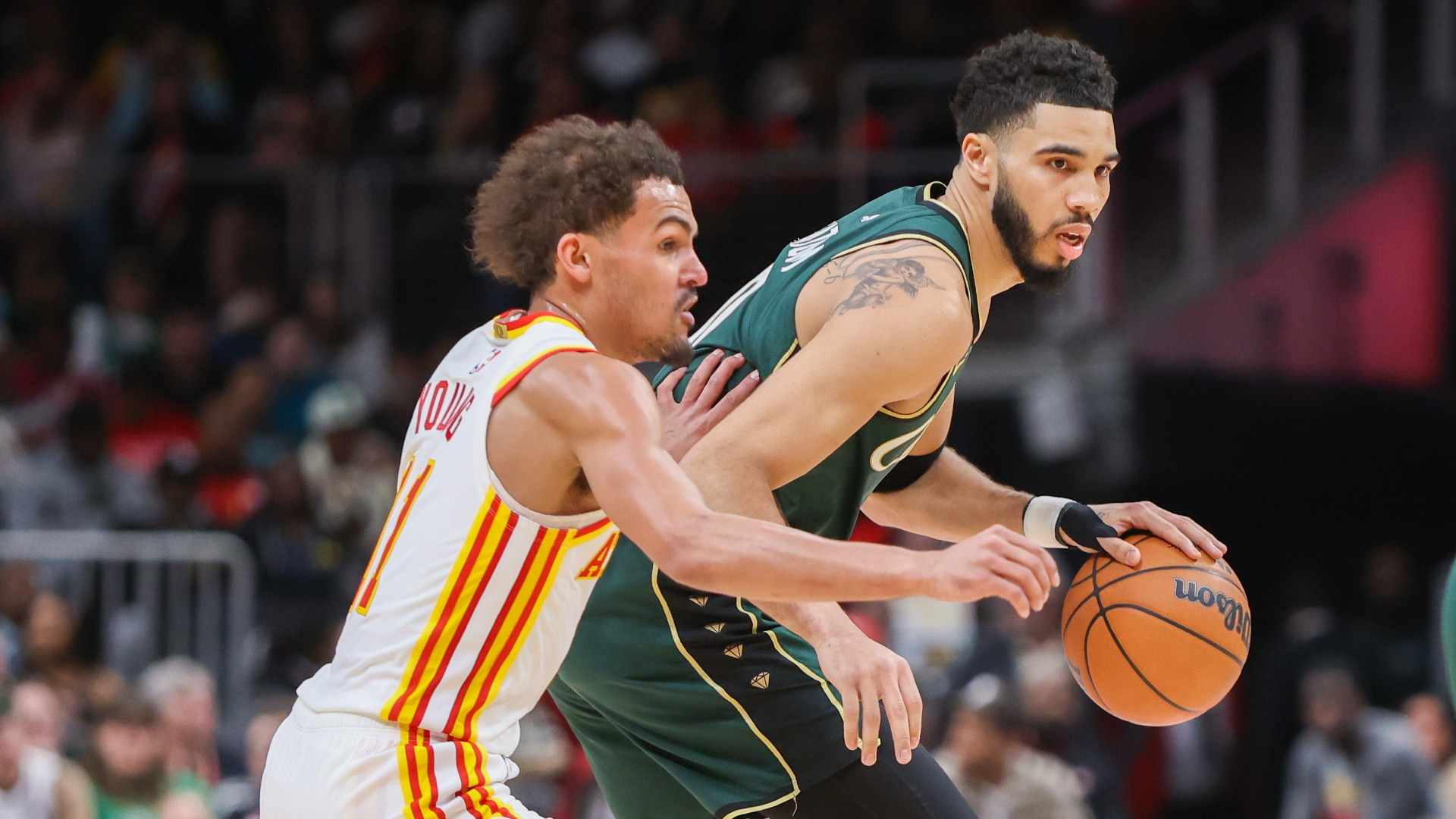 Boston Celtics forward Jayson Tatum and Atlanta Hawks guard Trae Young