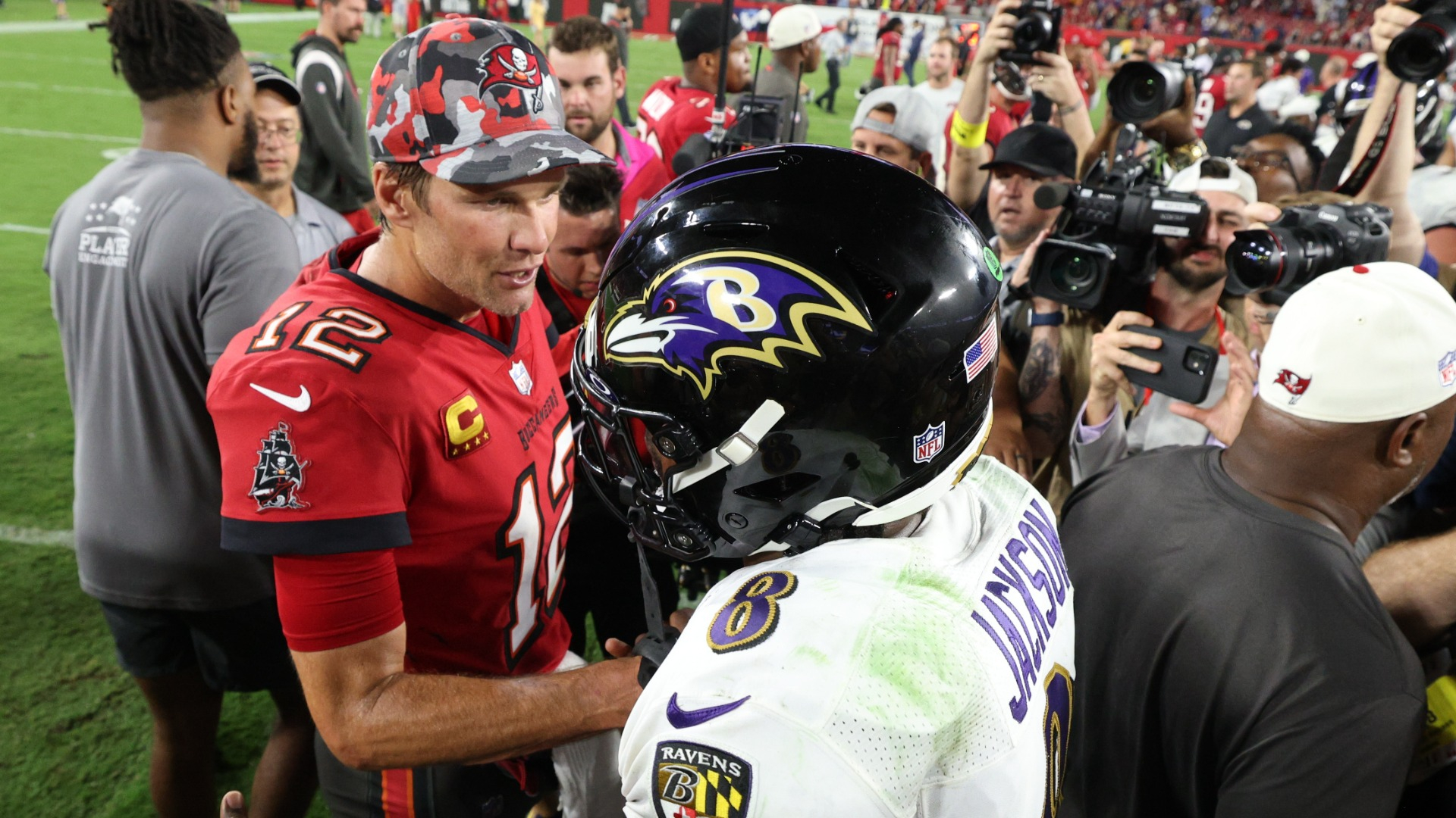 Former NFL quarterback Tom Brady and Baltimore Ravens quarterback Lamar Jackson