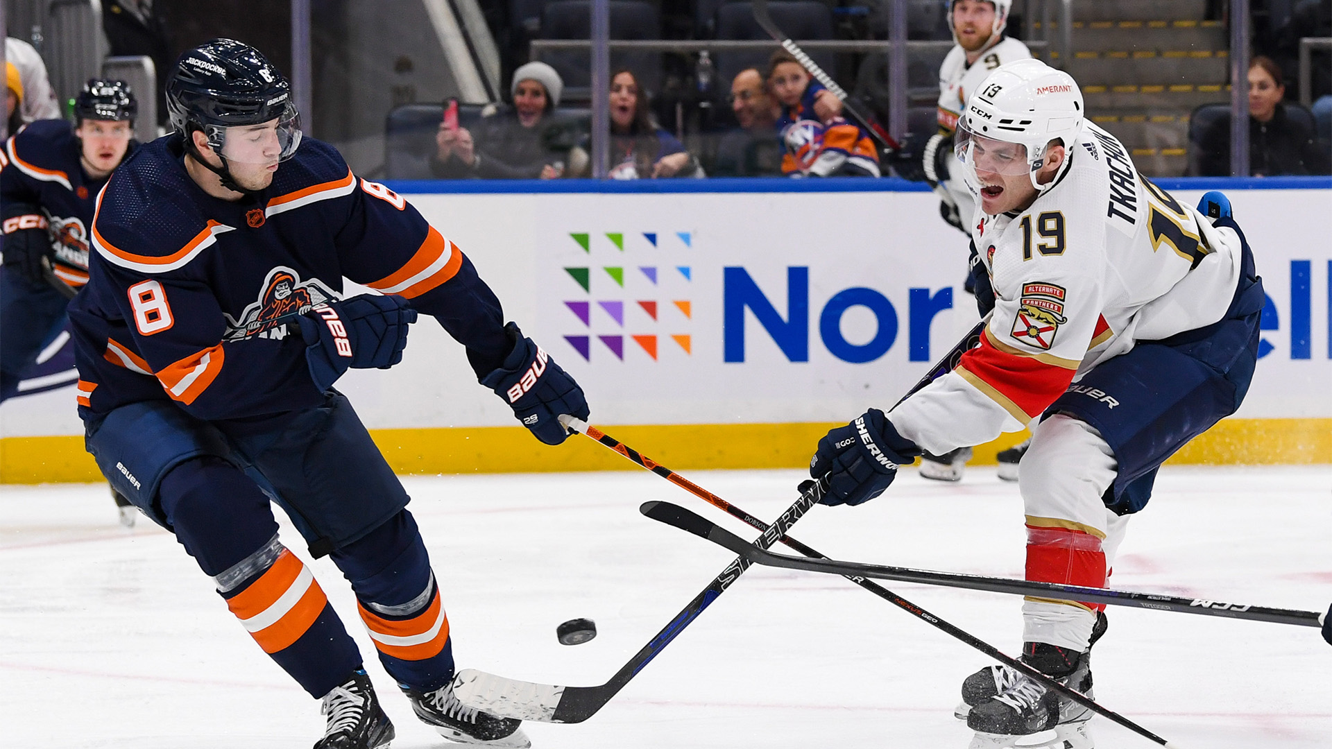 Florida Panthers left wing Matthew Tkachuk and New York Islanders defenseman Noah Dobson