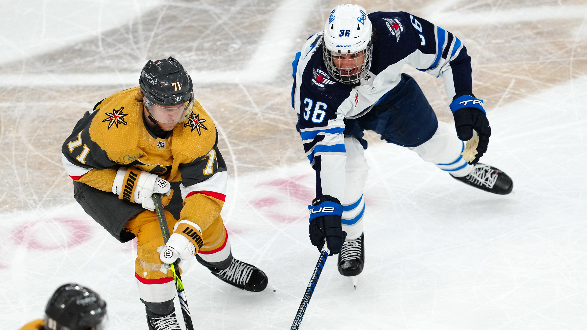 Vegas Golden Knights center Williams Karlsson and Winnipeg Jets center Morgan Barron