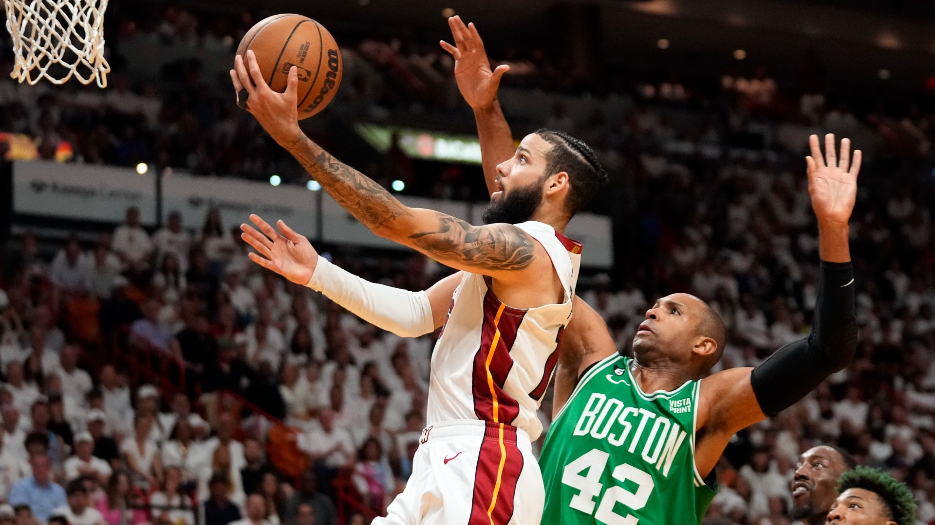 Miami Heat forward Caleb Martin, Boston Celtics center Al Horford