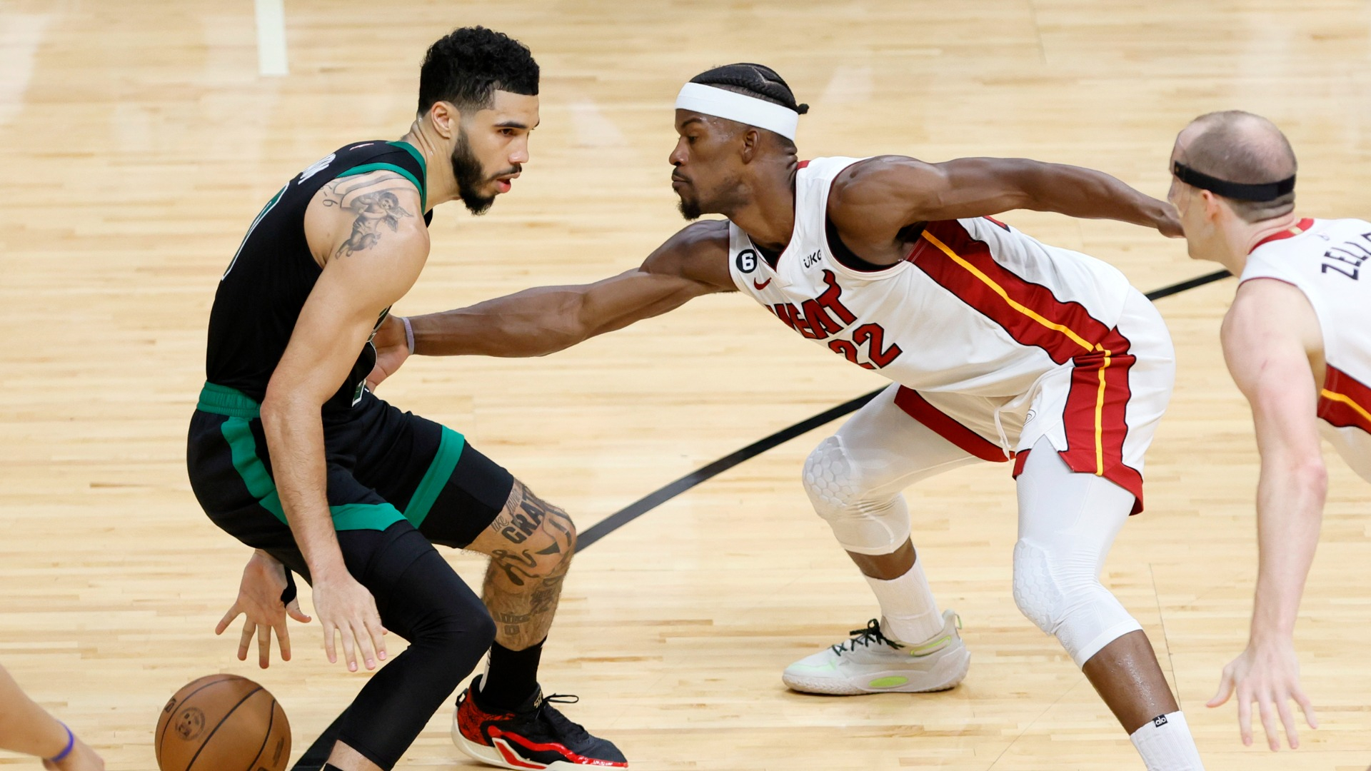 Boston Celtics forward Jayson Tatum and Miami Heat forward Jimmy Butler