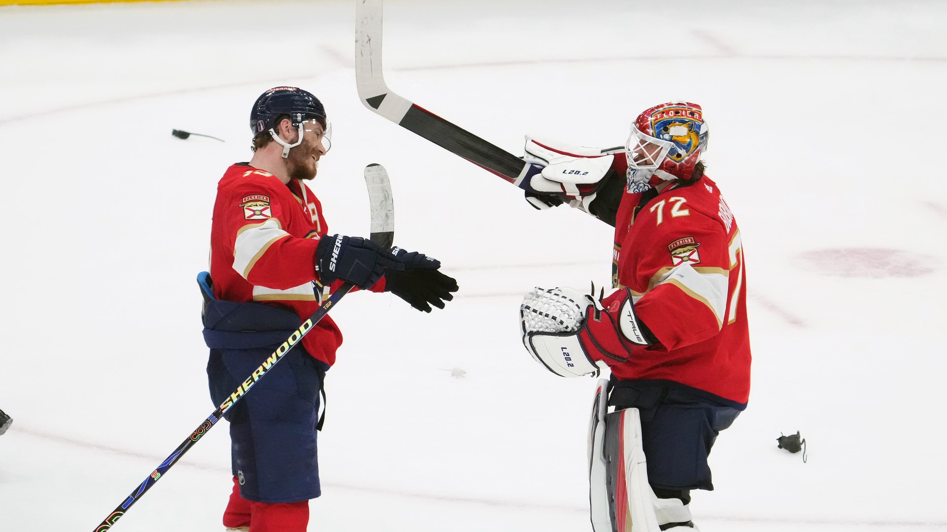 Florida Panthers center Matthew Tkachuk, goalie Sergei Bobrovsky