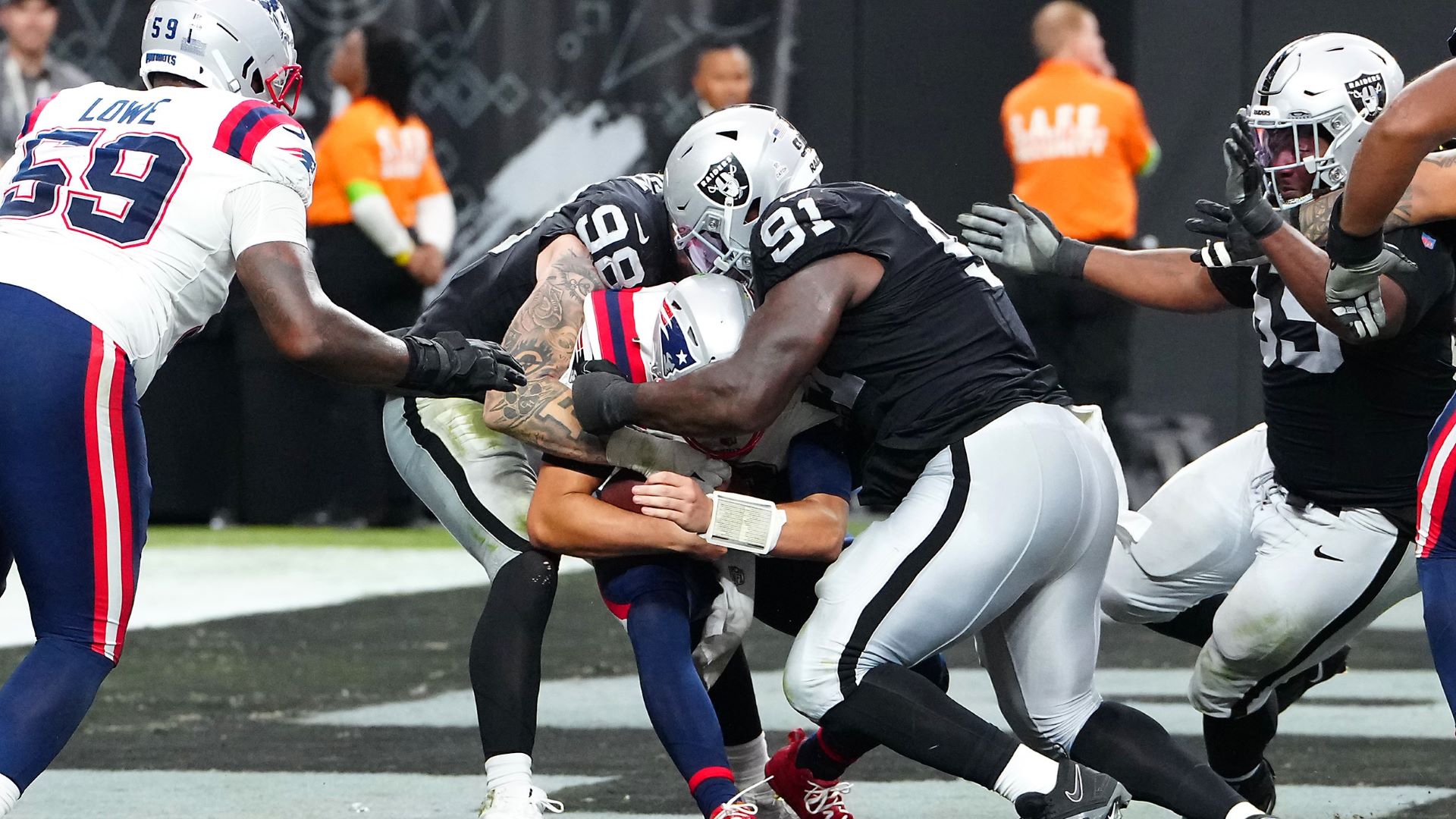 Las Vegas Raiders defensive linemen Maxx Crosby and Bilal Nichols and New England Patriots quarterback Mac Jones