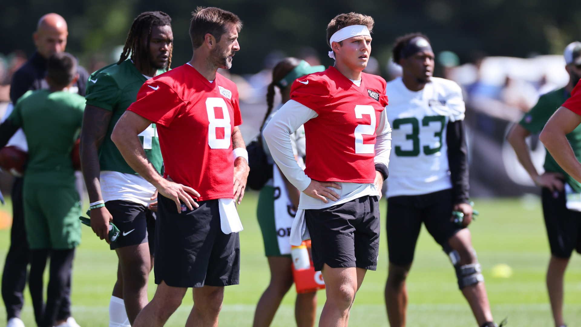 New York Jets quarterbacks Aaron Rodgers, Zach Wilson