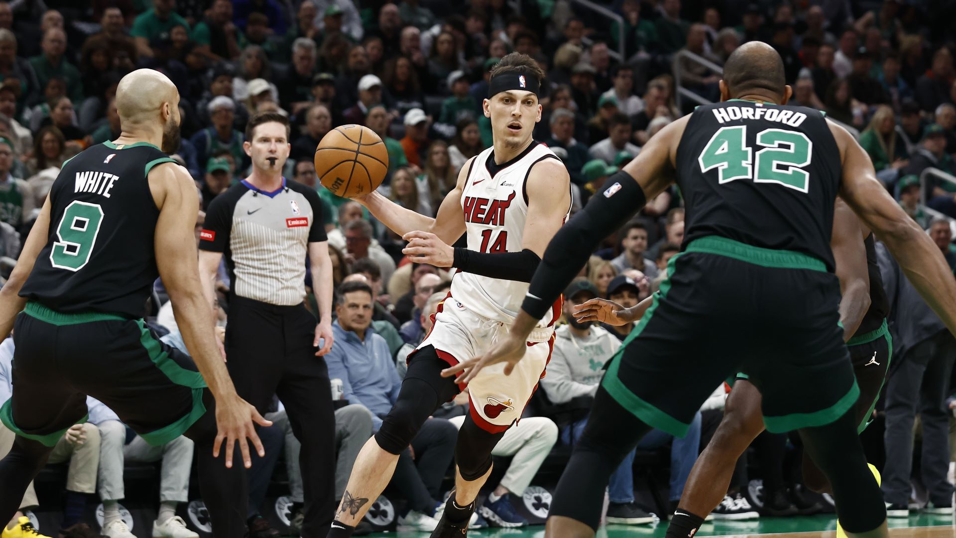 Miami Heat guard Tyler Herro and Boston Celtics guard Derrick White and forward Al Horford