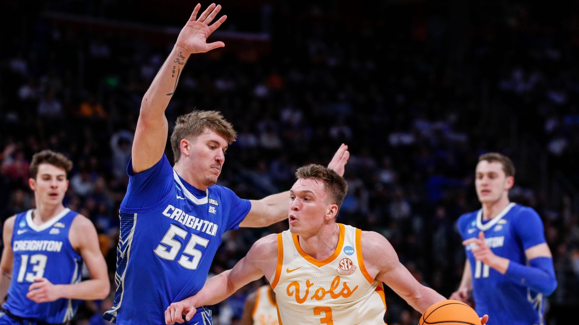 Boston Celtics guard Baylor Scheierman and Los Angeles Lakers guard Dalton Knecht