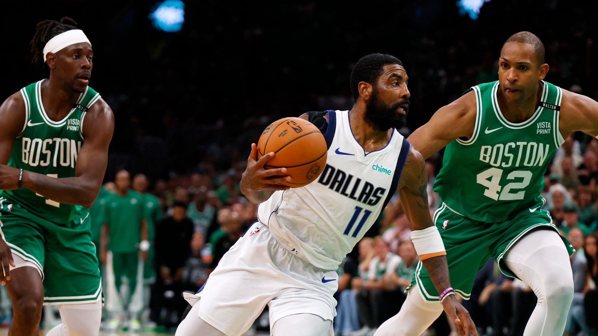Boston Celtics teammates Jrue Holiday and Al Horford and Dallas Mavericks guard Kyrie Irving