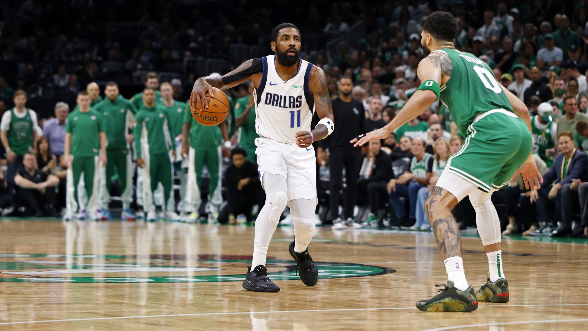 Dallas Mavericks guard Kyrie Irving and Boston Celtics forward Jayson Tatum