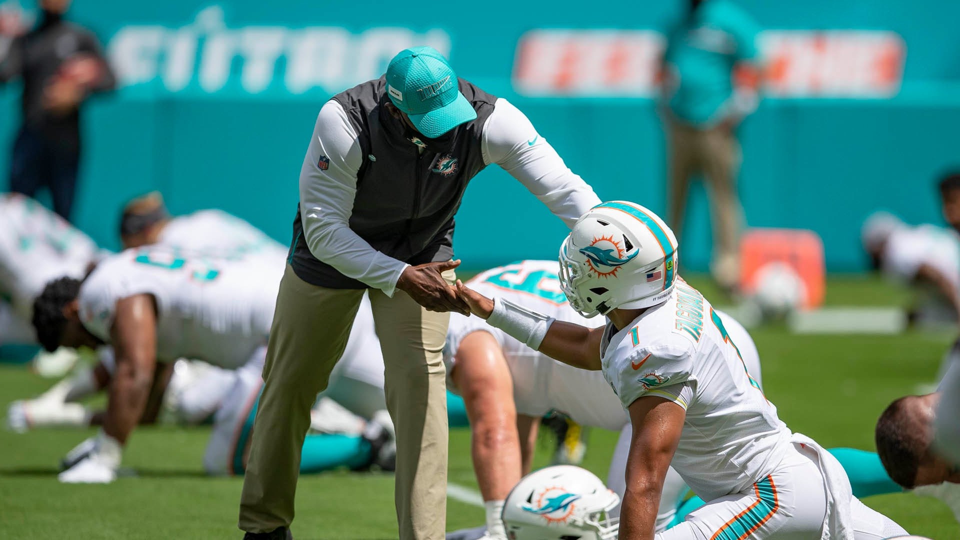 Minnesota Vikings defensive coordinator Brian Flores, Miami Dolphins quarterback Tua Tagovailoa