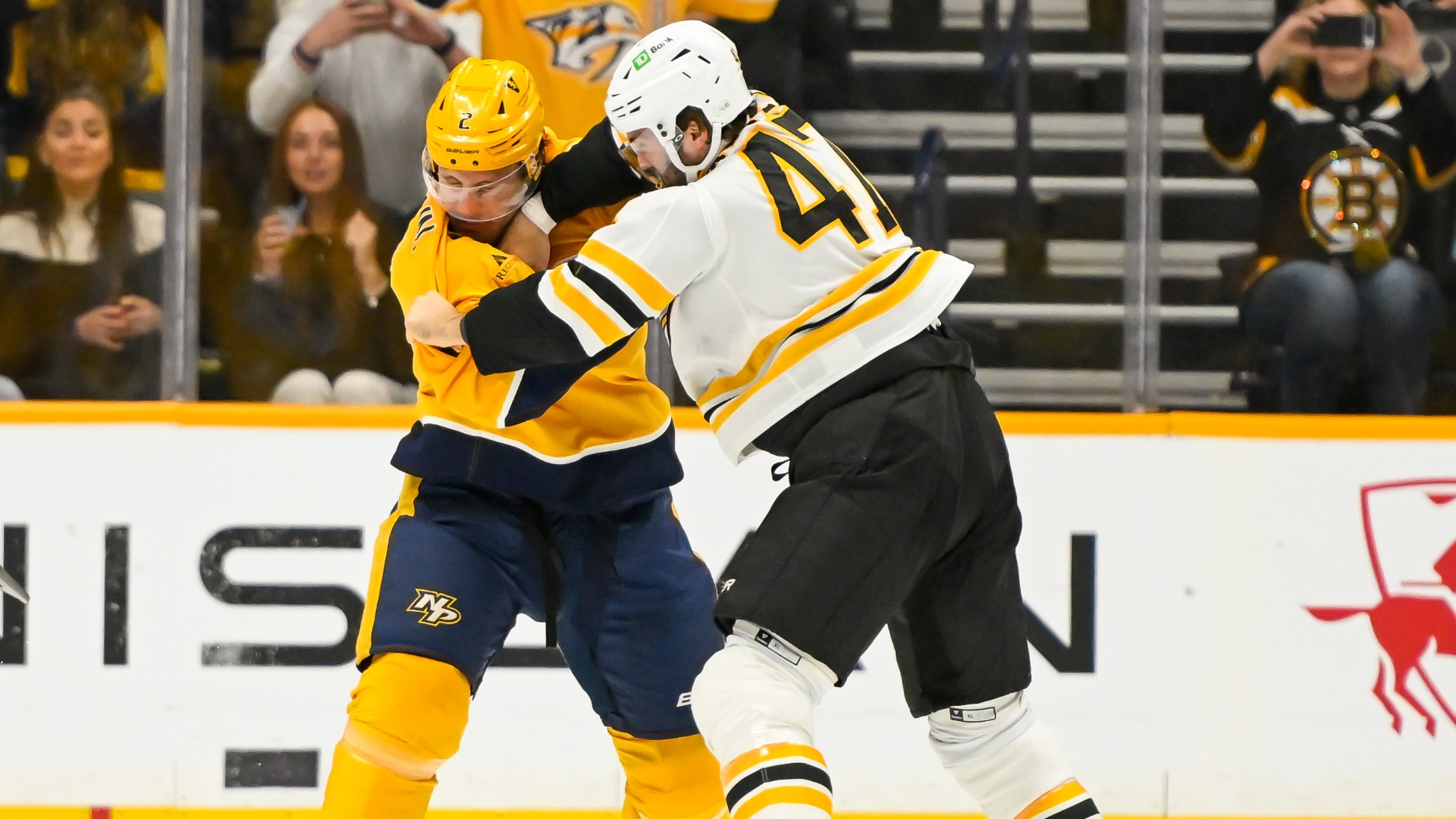 Boston Bruins forward Mark Kastelic and Nashville Predators defenseman Luke Schenn