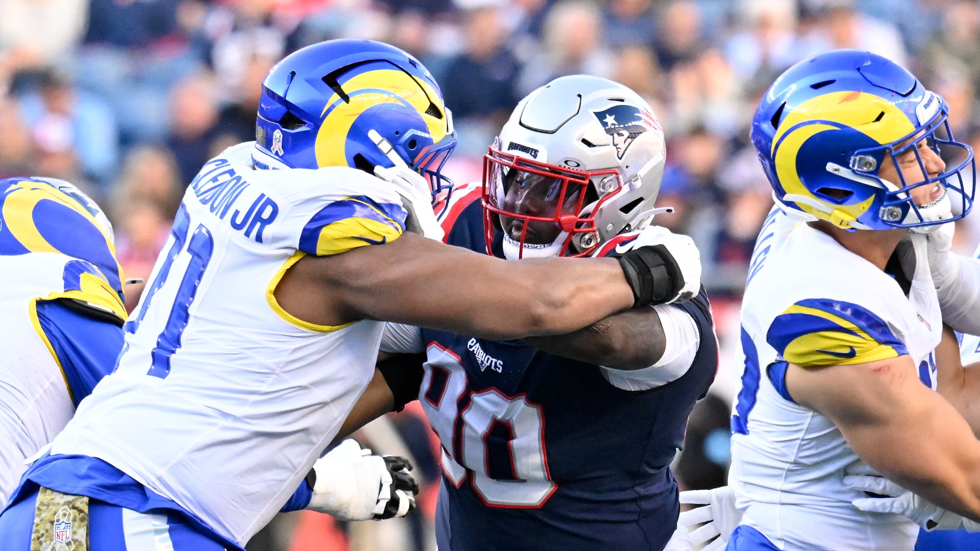 New England Patriots defensive tackle Christian Barmore and Los Angeles Rams offensive tackle Warren McClendon Jr.