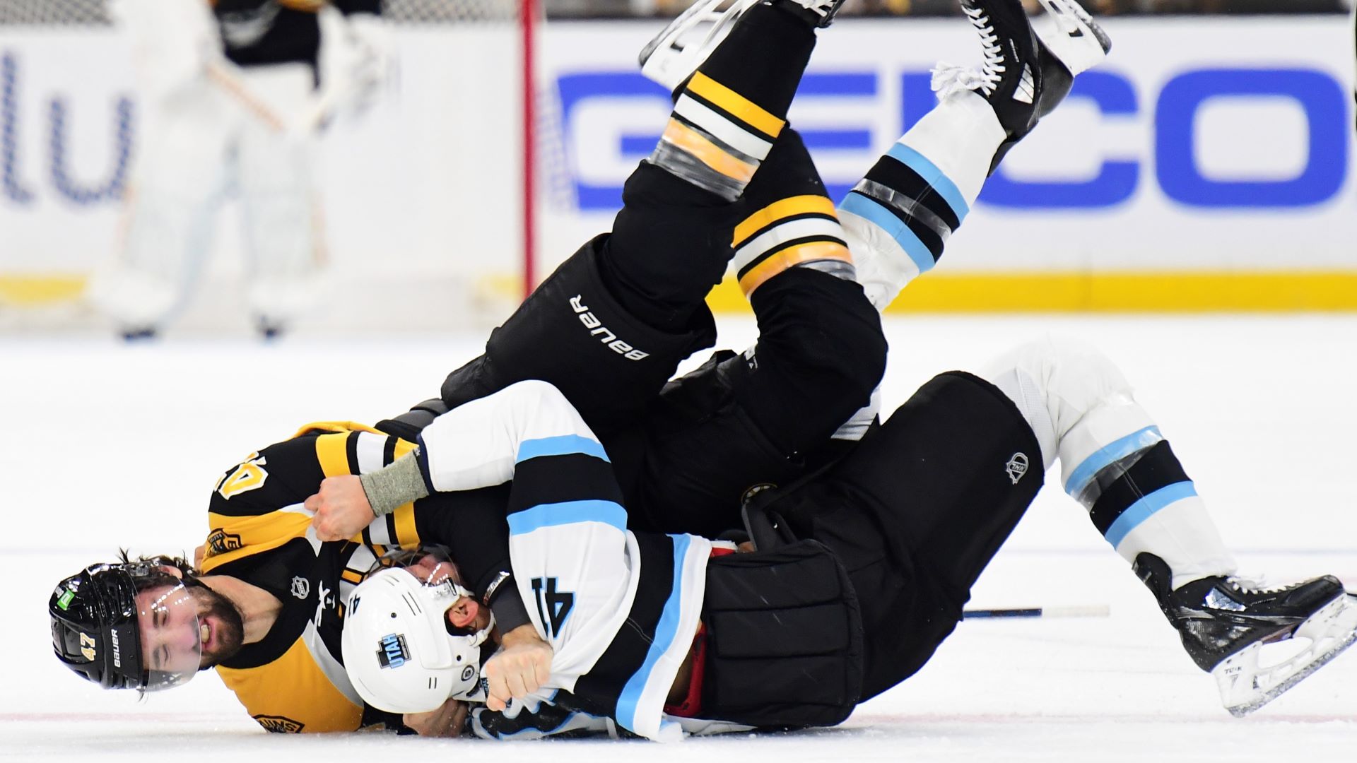 Boston Bruins forward Mark Kastelic and Utah Hockey Club defenseman Robert Bortuzzo