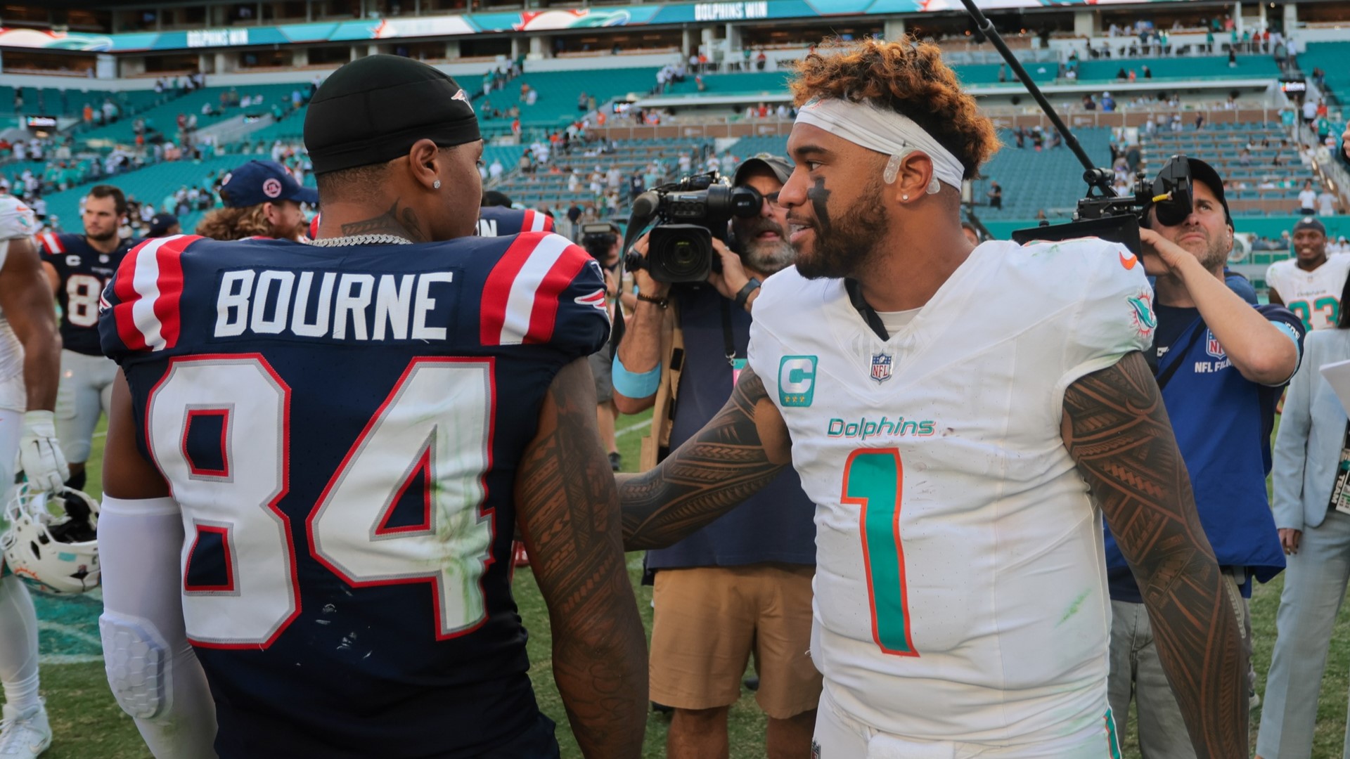New England Patriots wide receiver Kendrick Bourne, Miami Dolphins quarterback Tua Tagovailoa
