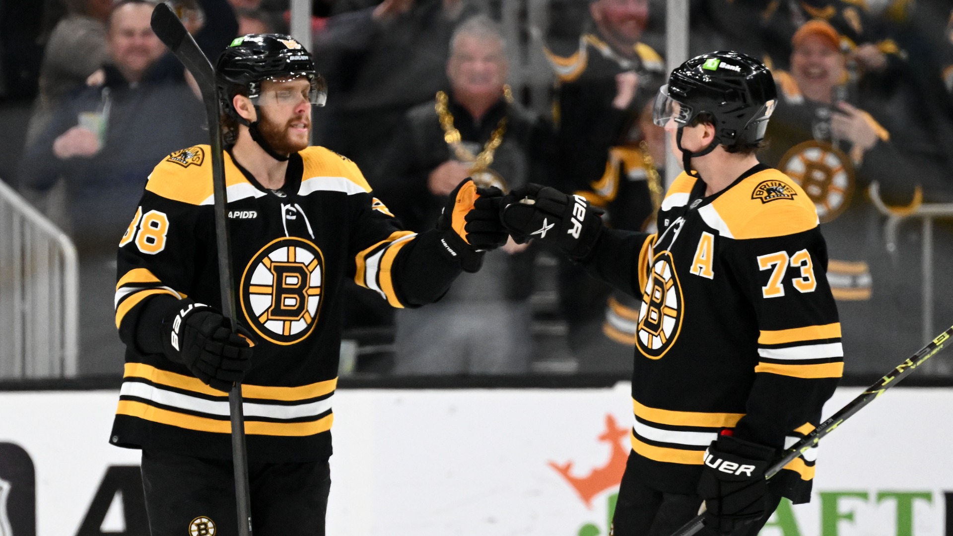 Boston Bruins forward David Pastrnak and defenseman Charlie McAvoy